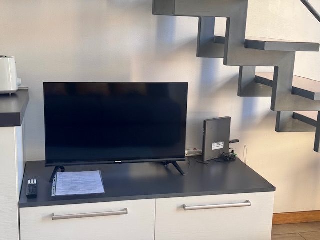 Wi-Fi ultra-stabile e TV in loft operativo a Scalo Romana, perfetto per Business Stay vicino a Symbiosis.