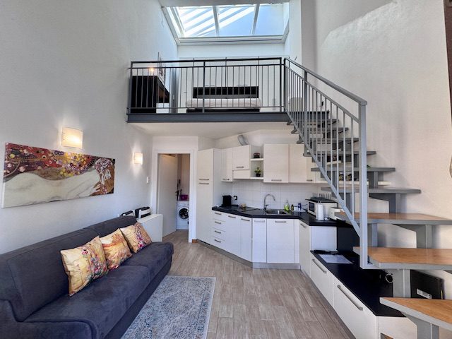 Alloggio loft di design funzionale a Milano Scalo Romana, base ideale per business, eventi sportivi e Fondazione Prada.